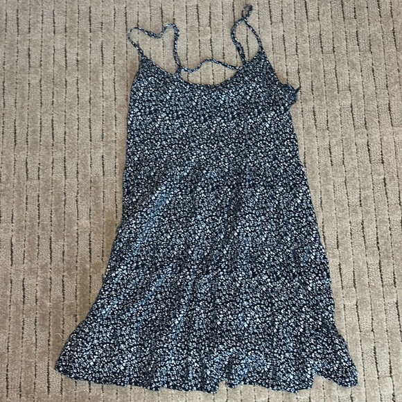 Divided Dresses & Skirts - Navy and white floral tiered babydoll dress